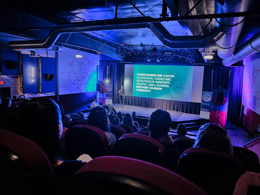 Community members gathered in the Mothership theater at the Lyric for our 2025 kick off presentation.
